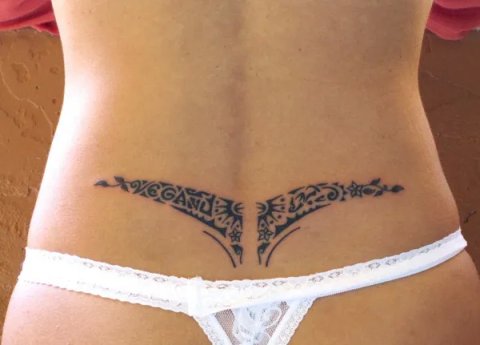 Elizabeth - Vegan lowerback: inked placement tattoo photo thumbnail