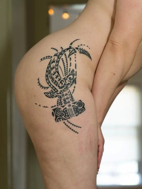 Evey - Riunga tattoo photo: inked placement tattoo photo thumbnail
