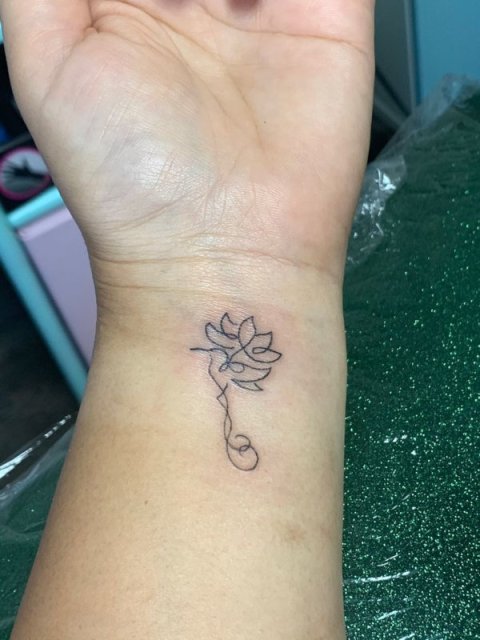Juanita - lotus hummingbird: real inked placement tattoo photo thumbnail