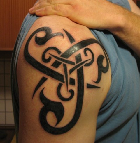 Steingrimur - Tribal triskell: real inked placement tattoo photo thumbnail