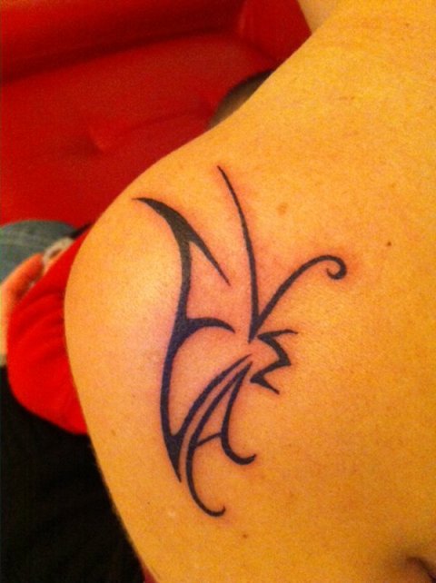 Amira - M+E+L+A butterfly: real inked placement tattoo photo thumbnail